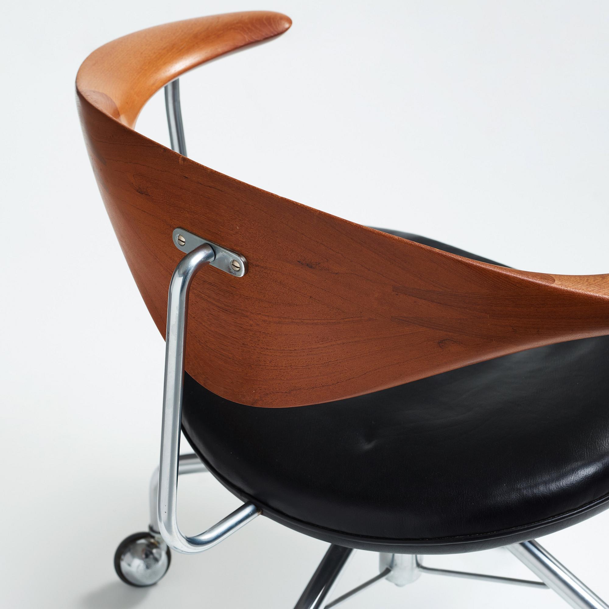 Hans J. Wegner, a "Swivel Chair" /JH502, executed by Johannes Hansen, Denmark 1960's.