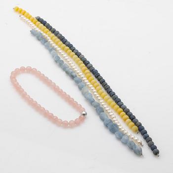 Ole Lynggaard, kullås 18K guld, med 4 stencollier med dobbar samt ett pärlcollier.