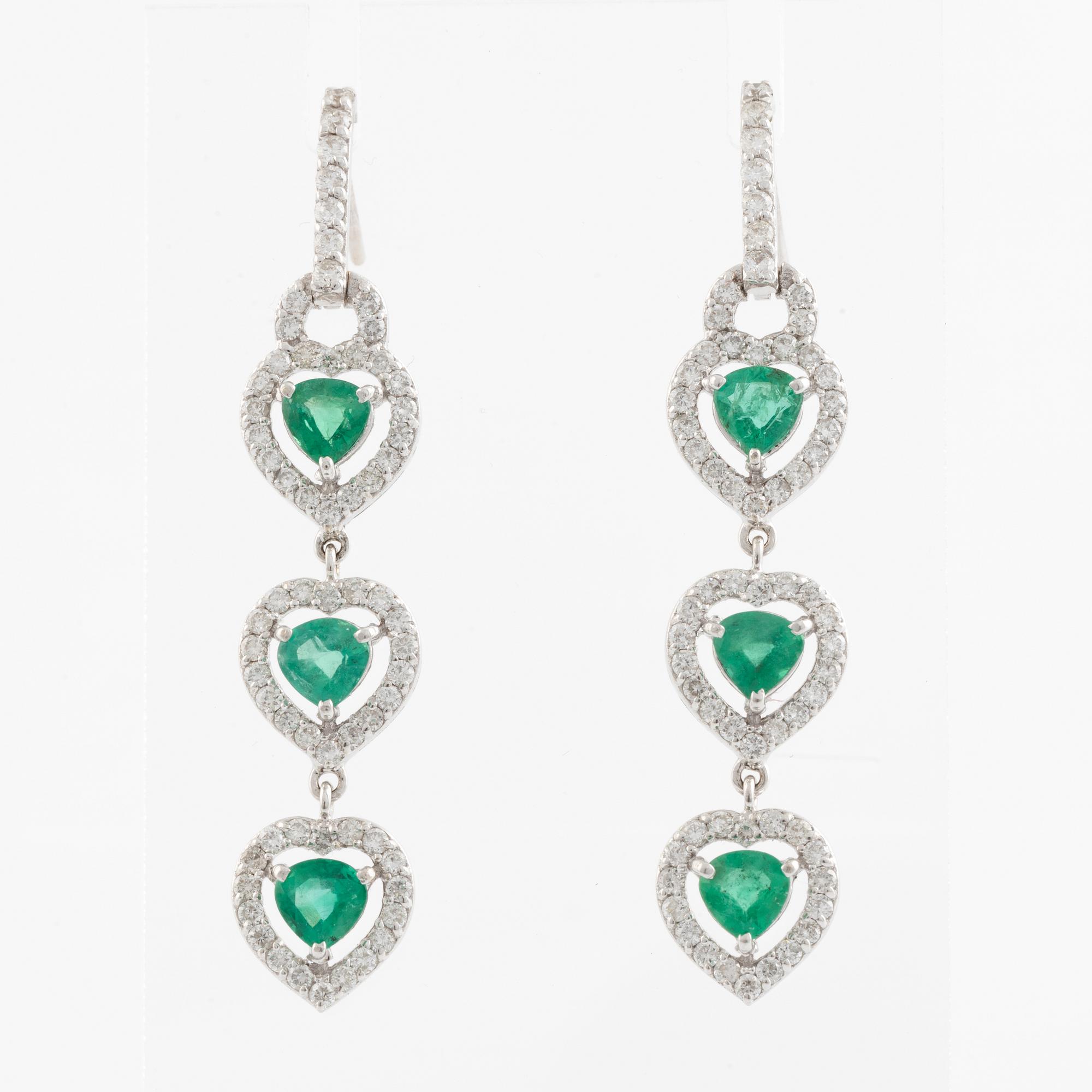 Emerald and brilliant cut diamond earrings.