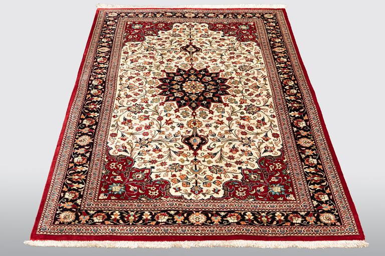 A carpet, Silk Qum, ca 116 x 75 cm.