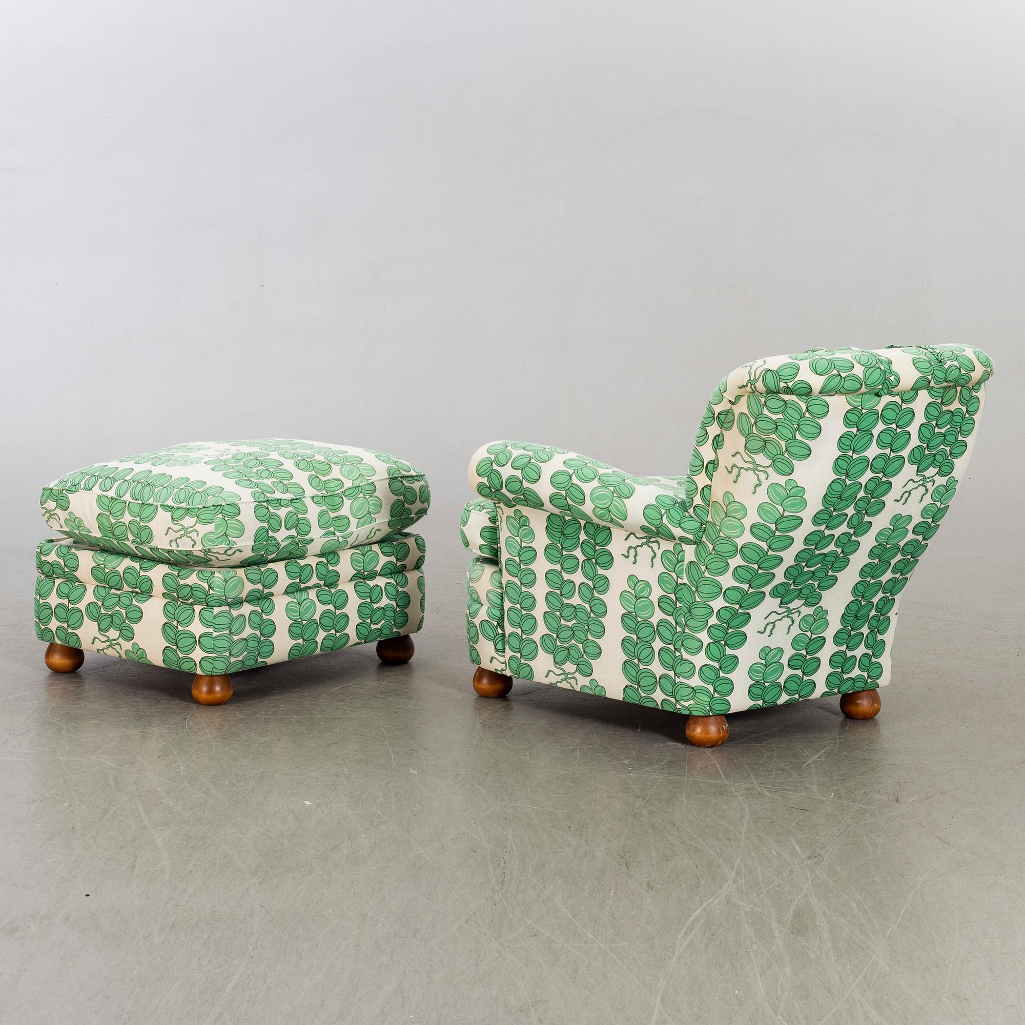 A model 336 easy chair with stool by Josef Frank for Firma Svenskt Tenn, Sweden.
