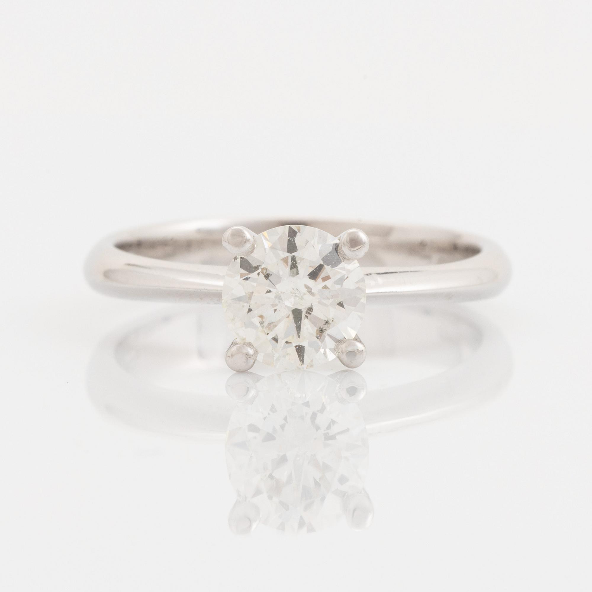 Brilliant cut diamond solitaire ring, with IGI report.