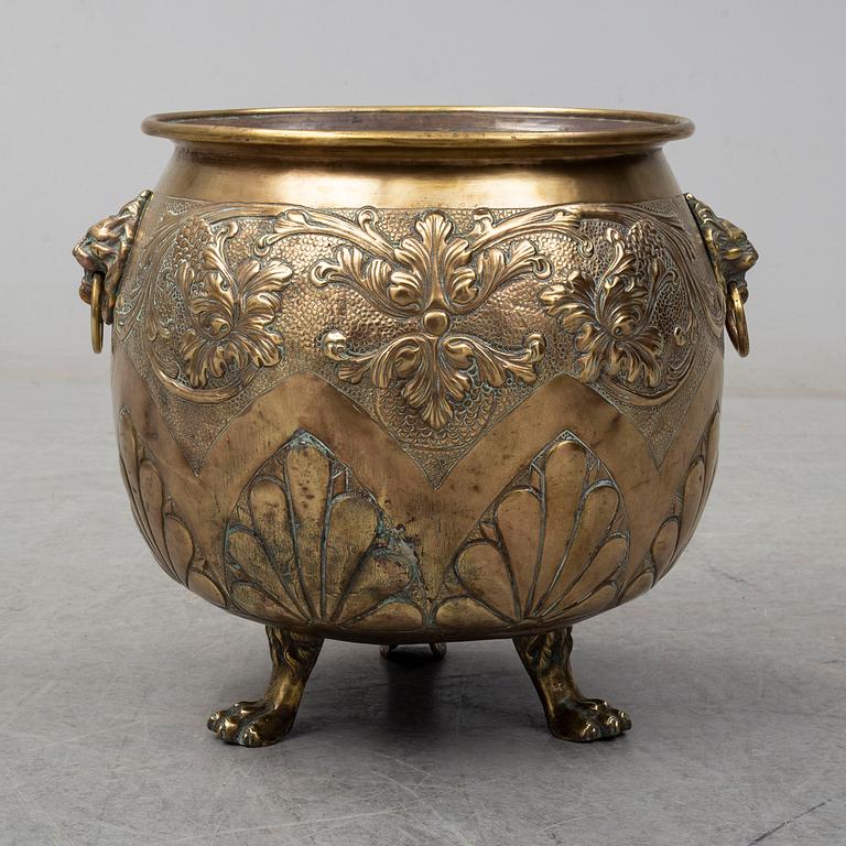 An 18th century brass flower pot.