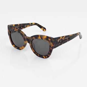 Karen Walker, a pair of tortoise "Northern lights" sunglasses.