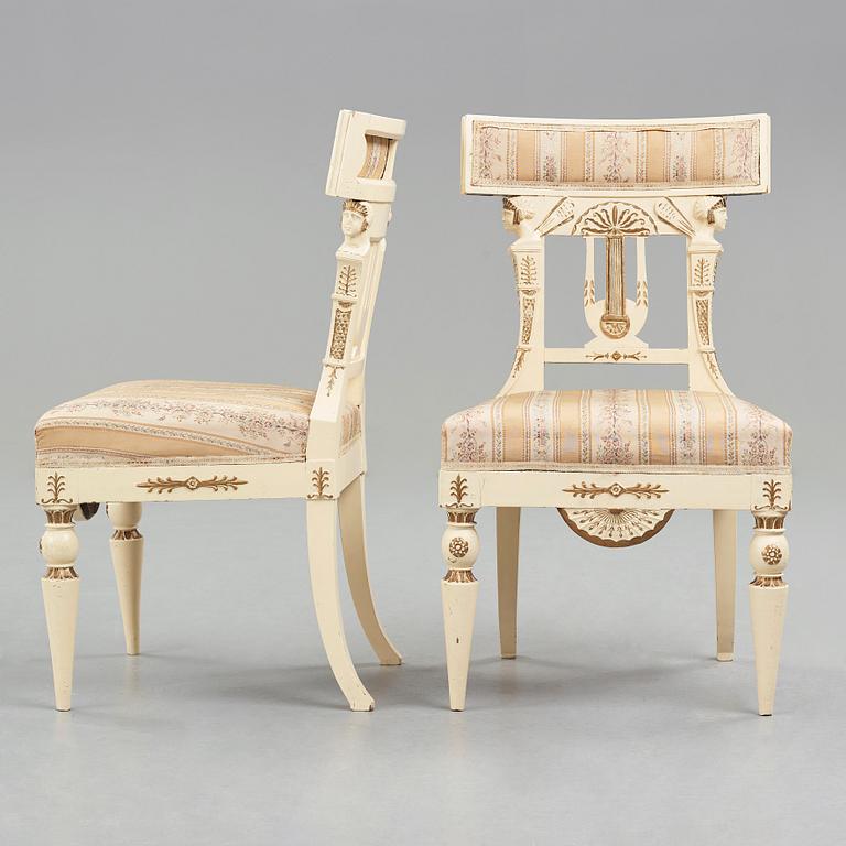 A pair of late Gustavian early 19th century chairs in the manner of Carl Christoffer Gjörwell (1766-1837).