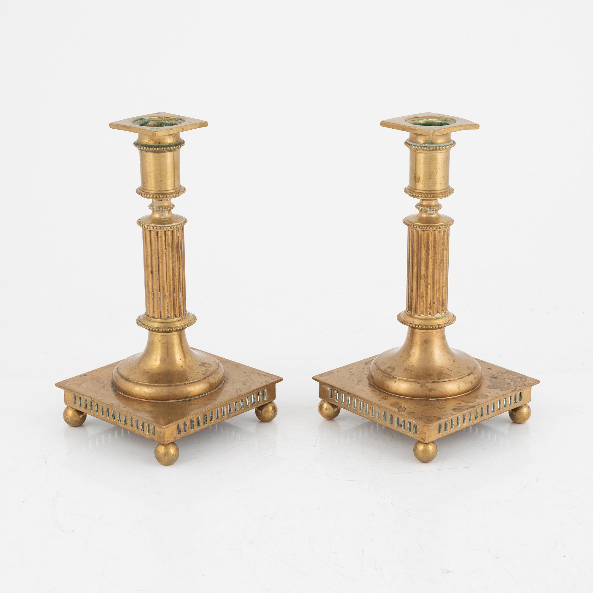 A Pair of Brass Candlesticks, Gusum.
