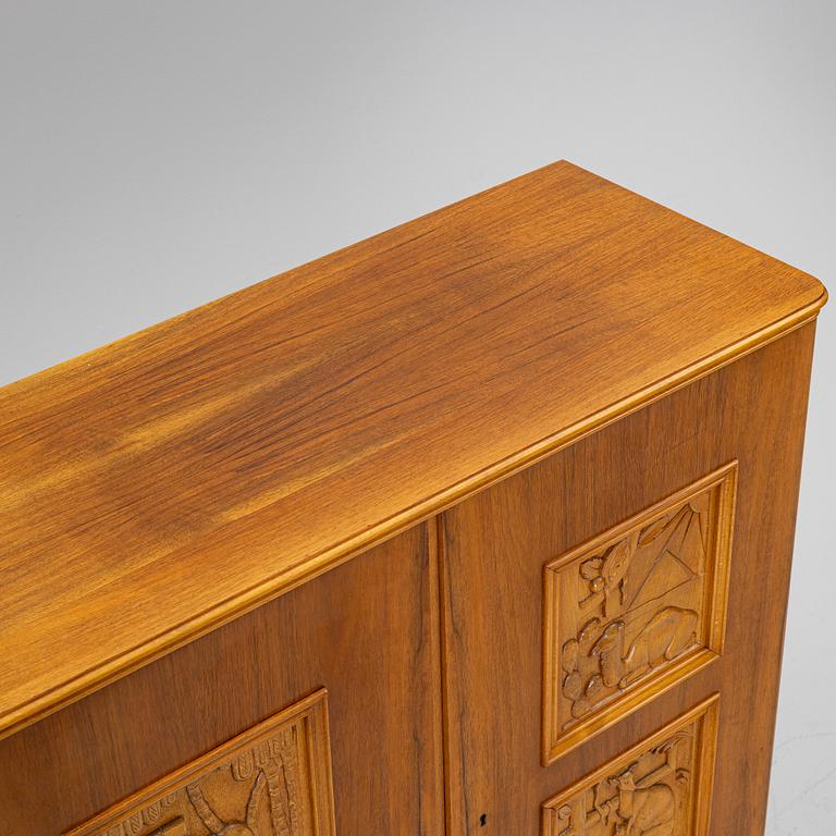 Eugen Höglund, a walnut cabinet, executed in his workshop in Vetlanda, Sweden 1950s.