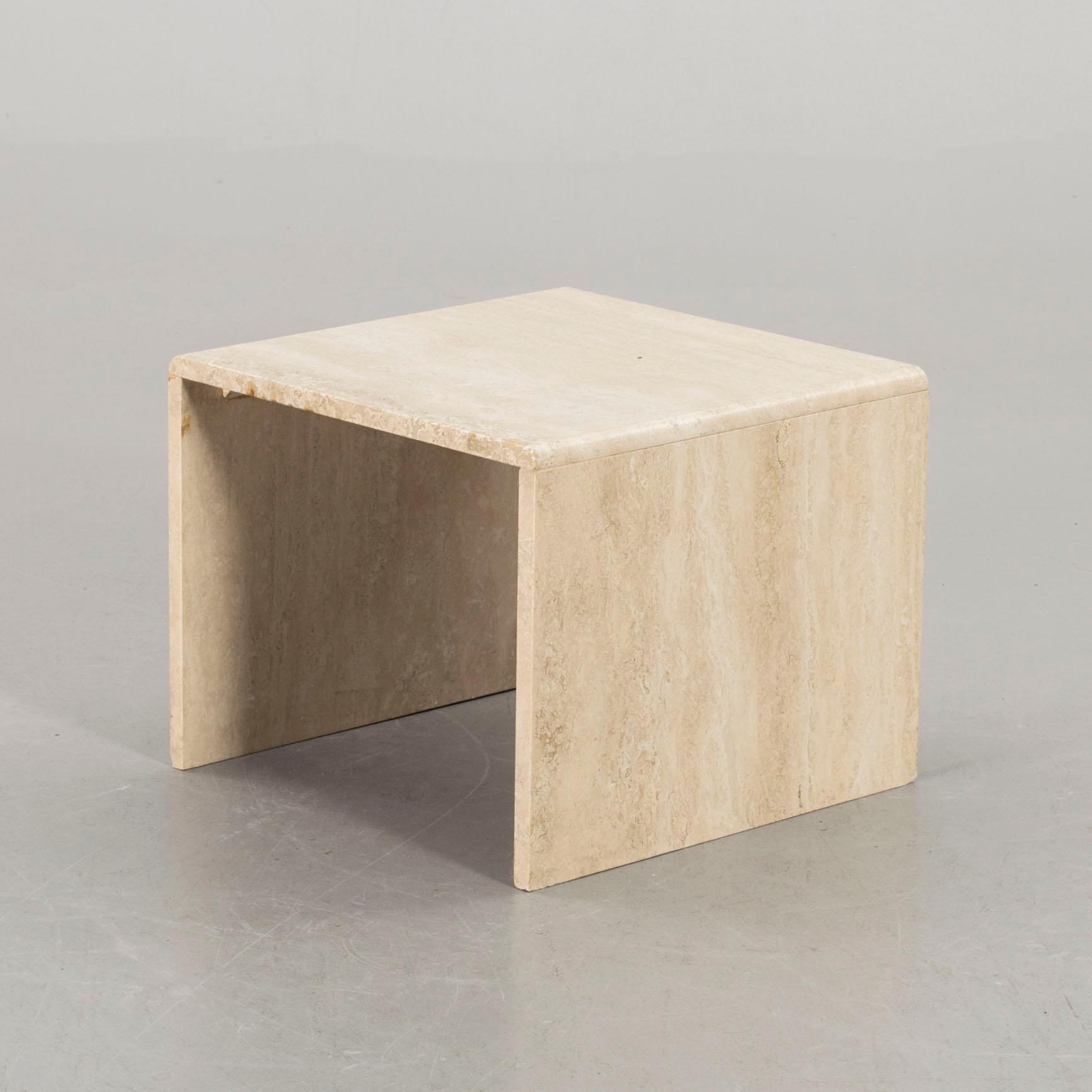 A TRAVERTINE SIDE TABLE.