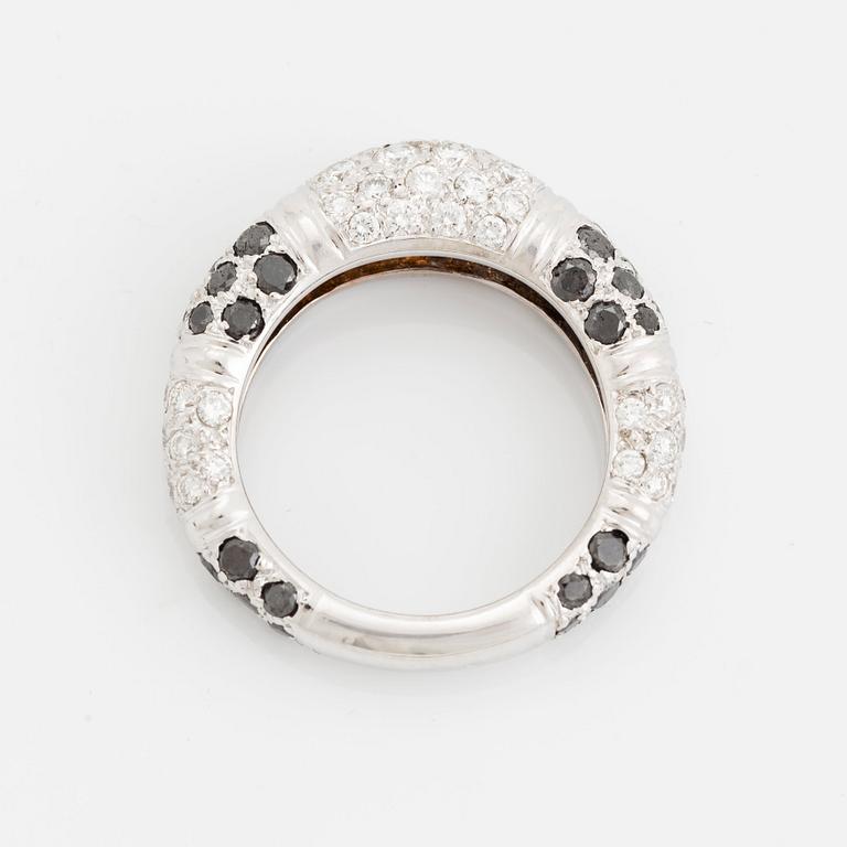 An 18K white gold Grisogono ring set with round brilliant-cut diamonds.