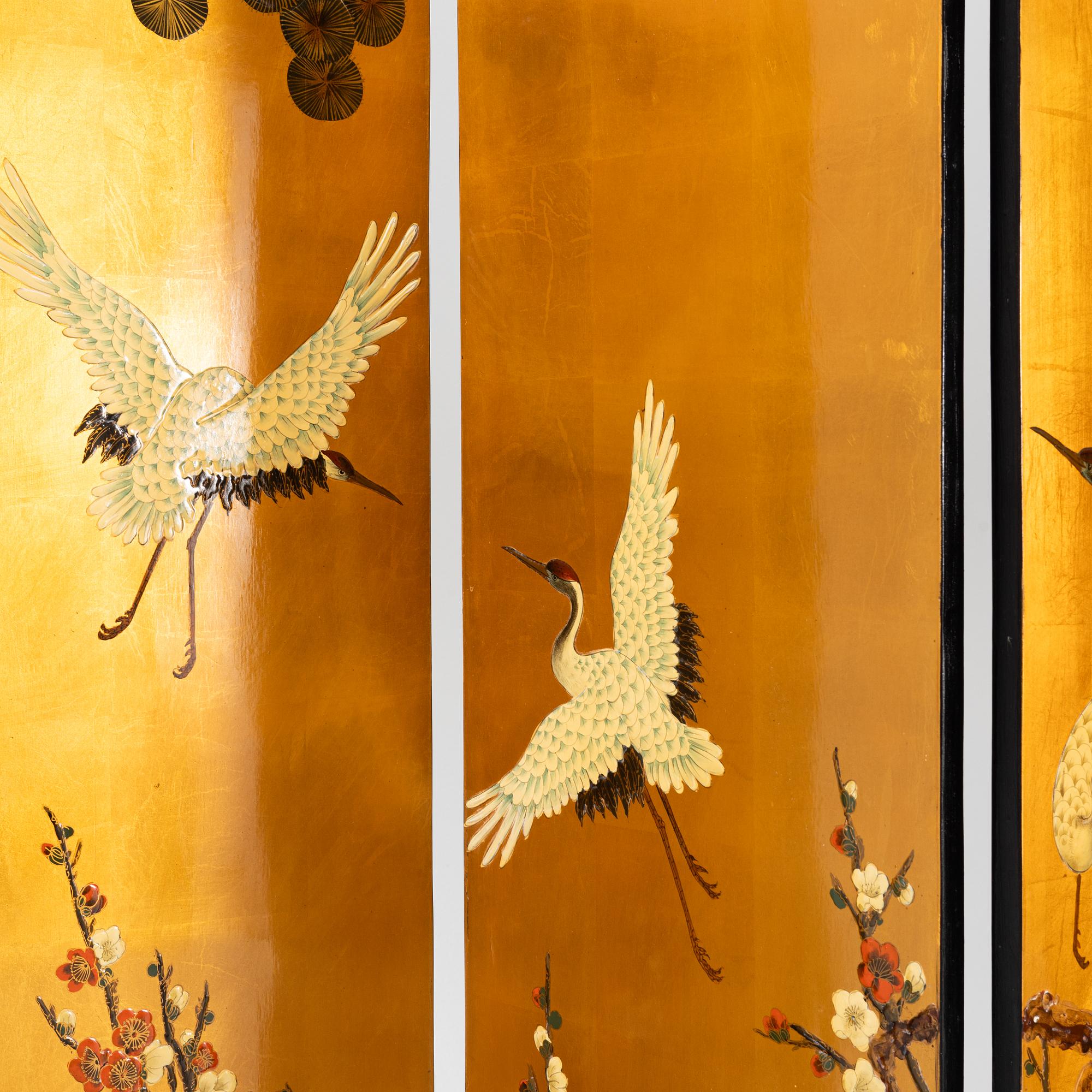 A Chinese lacquer folding screen, 20th century.
