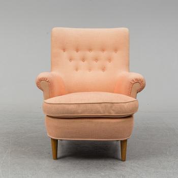 A 'Hemmakväll' easy chair by Carl Malmsten.