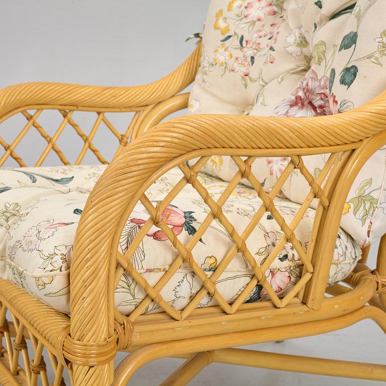 A rattan sofa and two armchairs, later part of the 20th century.
