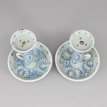 A pair of blue and white candle holders, Qing dynasty, late 19th century.