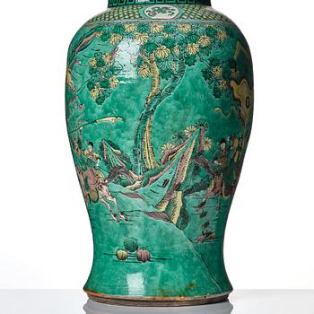 A massive famille verte bisquit vase, Qing dynasty with Kangxi mark to base.