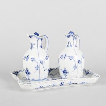 A pair of 'Blue Fluted' porcelain oil and vinegar pitchers and a tray, Royal Copenhagen, models 1179, 1180 and 1195.