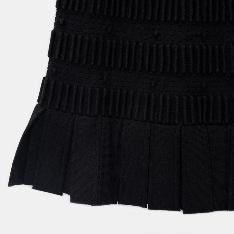 Alaïa, a black wool skirt, size 36.