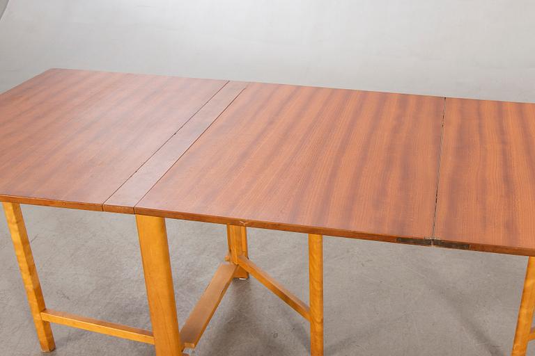 A teak and birch 'Maria Flap' gate leg table by Bruno Mathsson for Karl Mathsson.