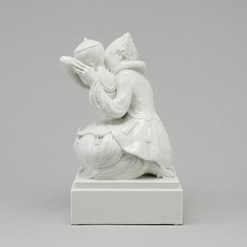 A white glazed Royal Copenhagen porcelain figure, Gerhard Henning, Danmark, 1920's.