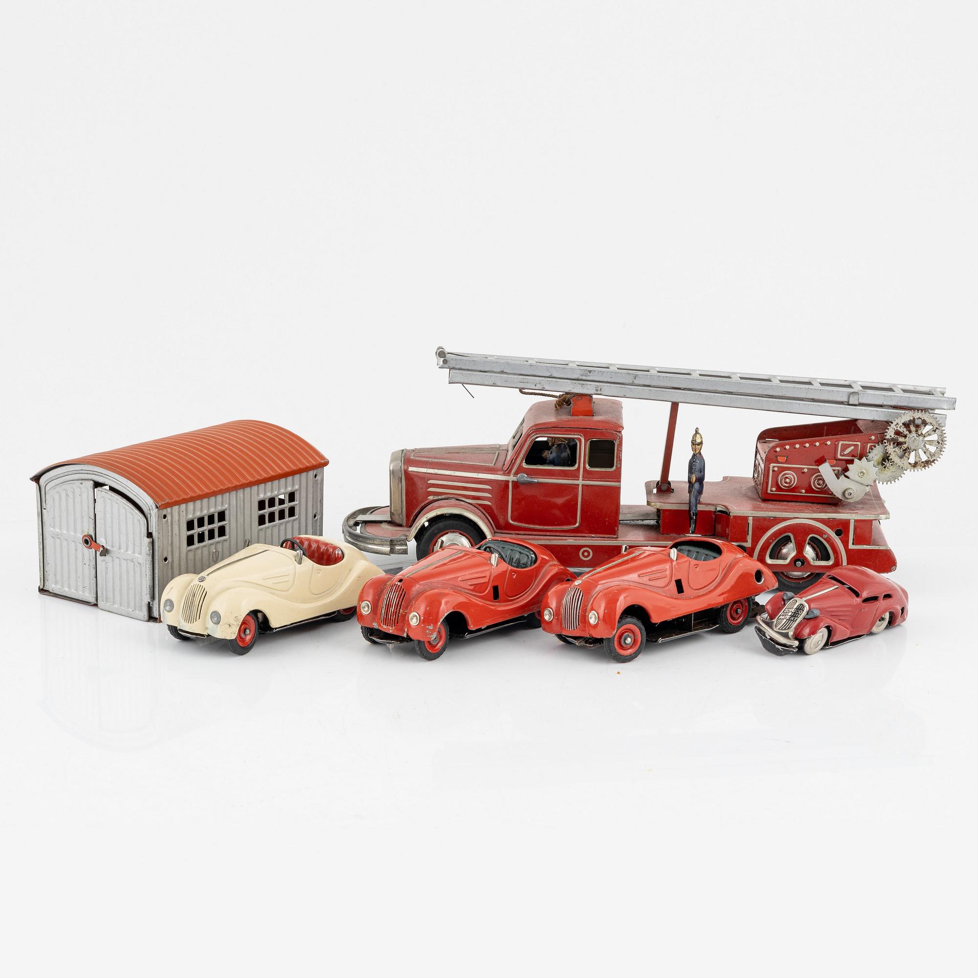 A set of five toy cars, mostly Schuco, Germany.