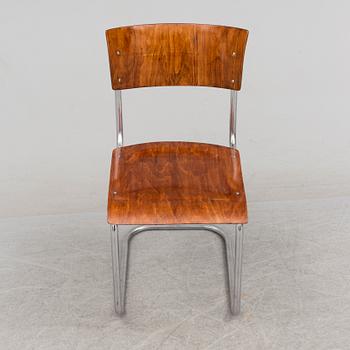 A 1930s writing desk by Jindrich Halabala and chair by Mart Stam.
