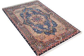 A Kerman Laver carpet, c. 252 x 150 cm.