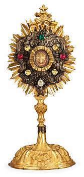 689. An 18th century gilt and silvered brass monstrance.