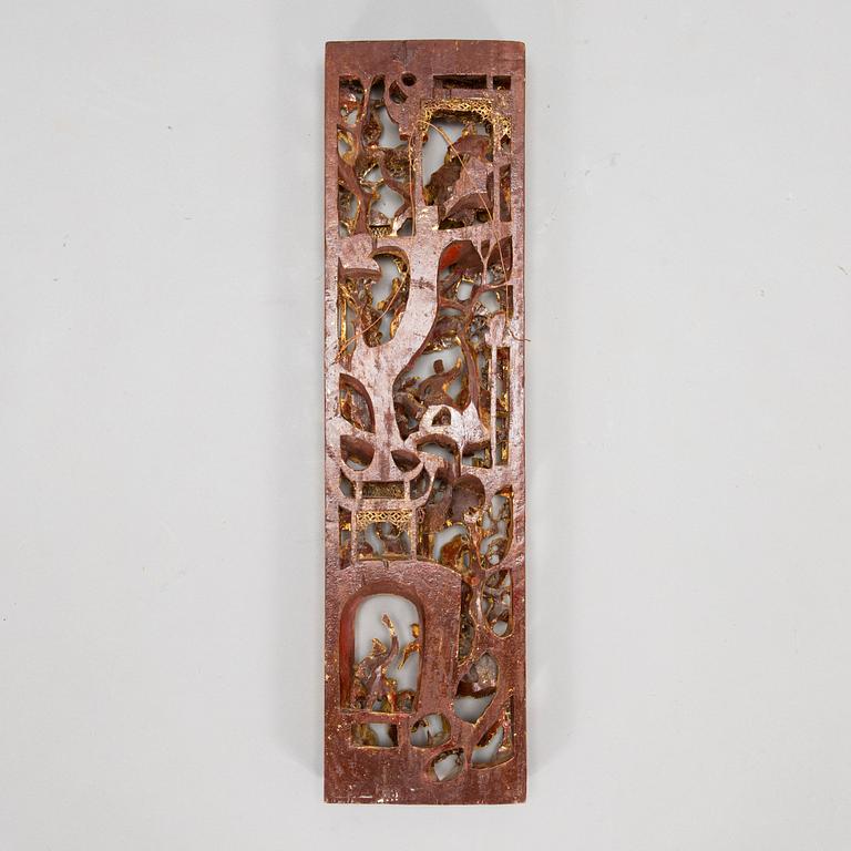 A Chinese carved and gilt wood panel, 20th century.