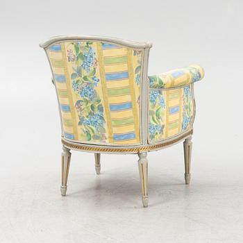 A Louis XVI style armchair, 20th Century.