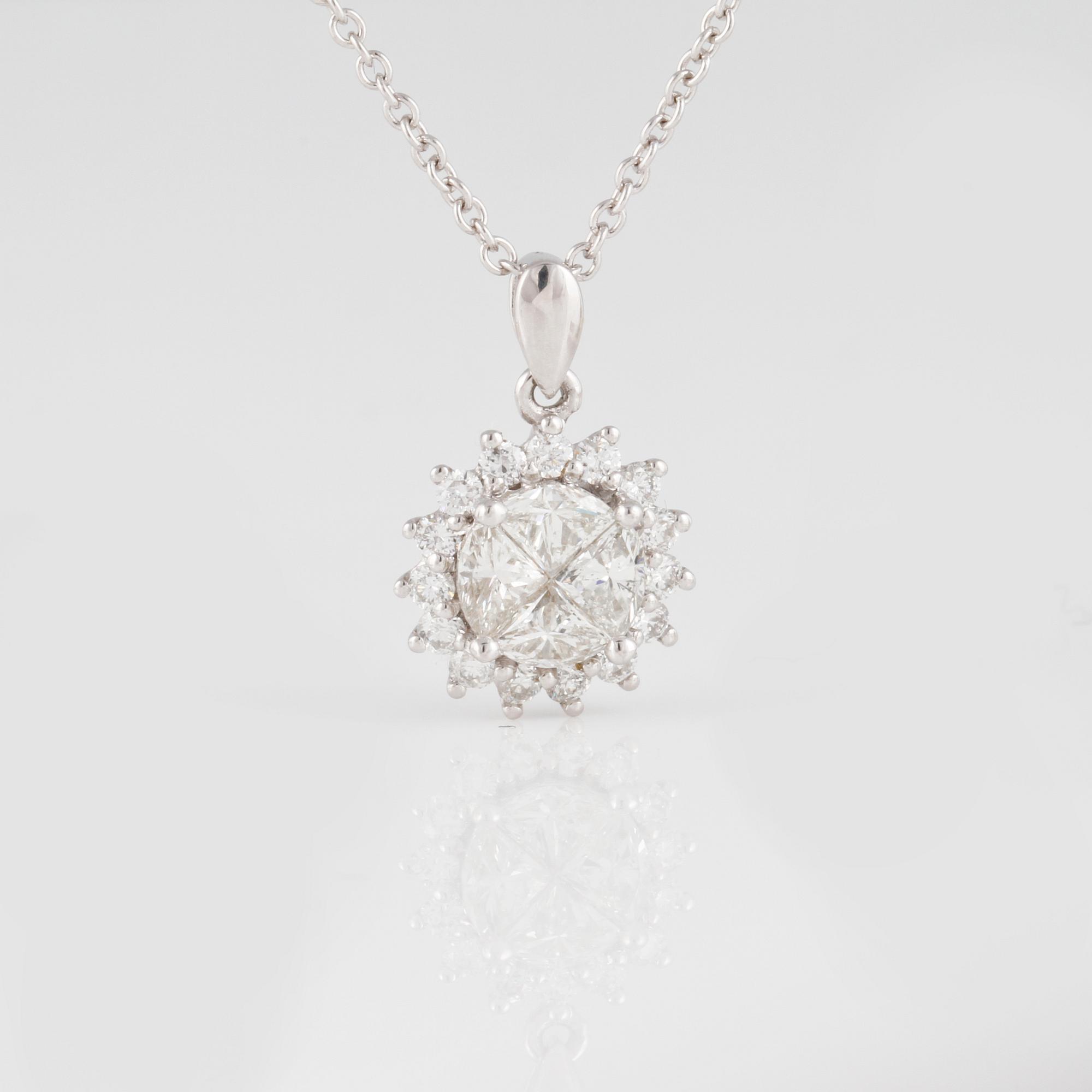 HÄNGE, 18K vitguld med fasett och briljantslipade diamanter ca 0.90 ct. Vikt 3,3 gram.