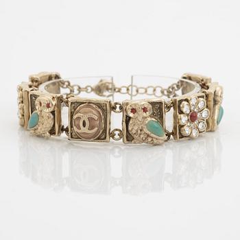 Chanel, a rhinestone and enamel bracelet.