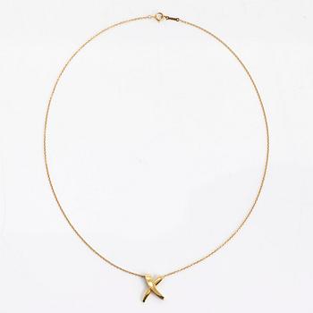Tiffany & Co, Paloma Picasso, an 18K gold 'X Kiss' necklace.