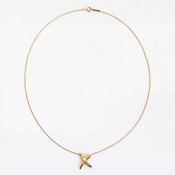 Tiffany & Co, Paloma Picasso, an 18K gold 'X Kiss' necklace.