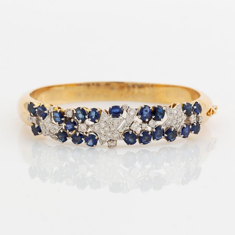 Sapphire and brilliant cut diamond bangle.