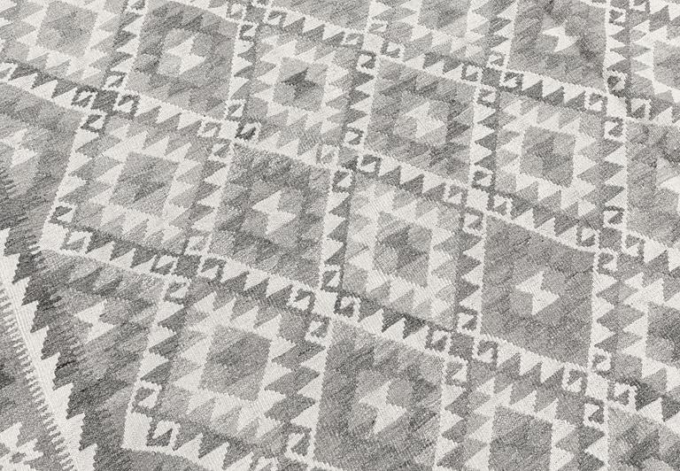 A carpet, kilim, ca 390 x 298 cm.