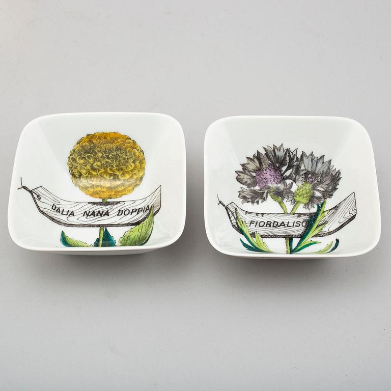 PIERO FORNASETTI, a porcelain ashtray, a jewelry dish and a pair of 'Botanica Pratica' bowls, Milan, Italy.