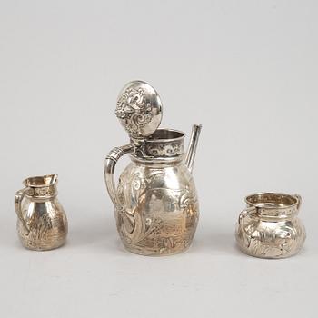 A Swedish silver coffee pot, creamer and sugar bowl, mark of Emil Oscar Möller, Malmö 1907.