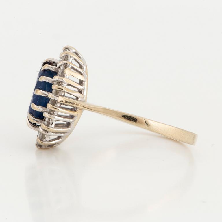 A sapphire and brilliant-cut diamond ring.