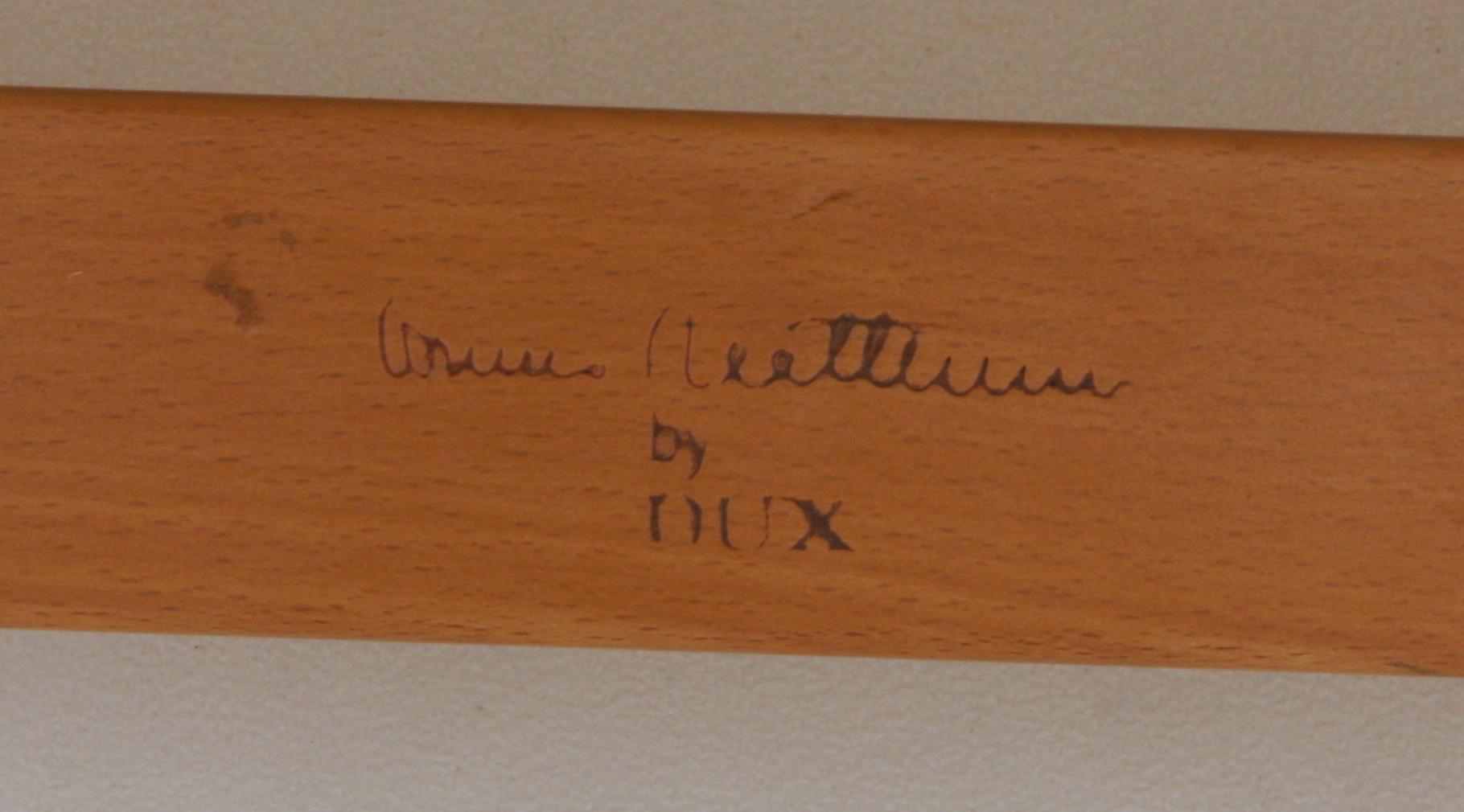 FÅTÖLJ MED FOTPALL, "Pernilla", brännmärkt  Bruno Mattsson by Dux.