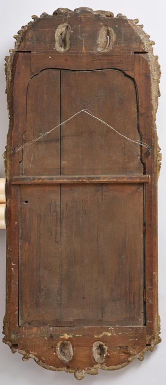 A Swedish giltwood and polychrome-painted Rococo mirror, later part of the 18th century.