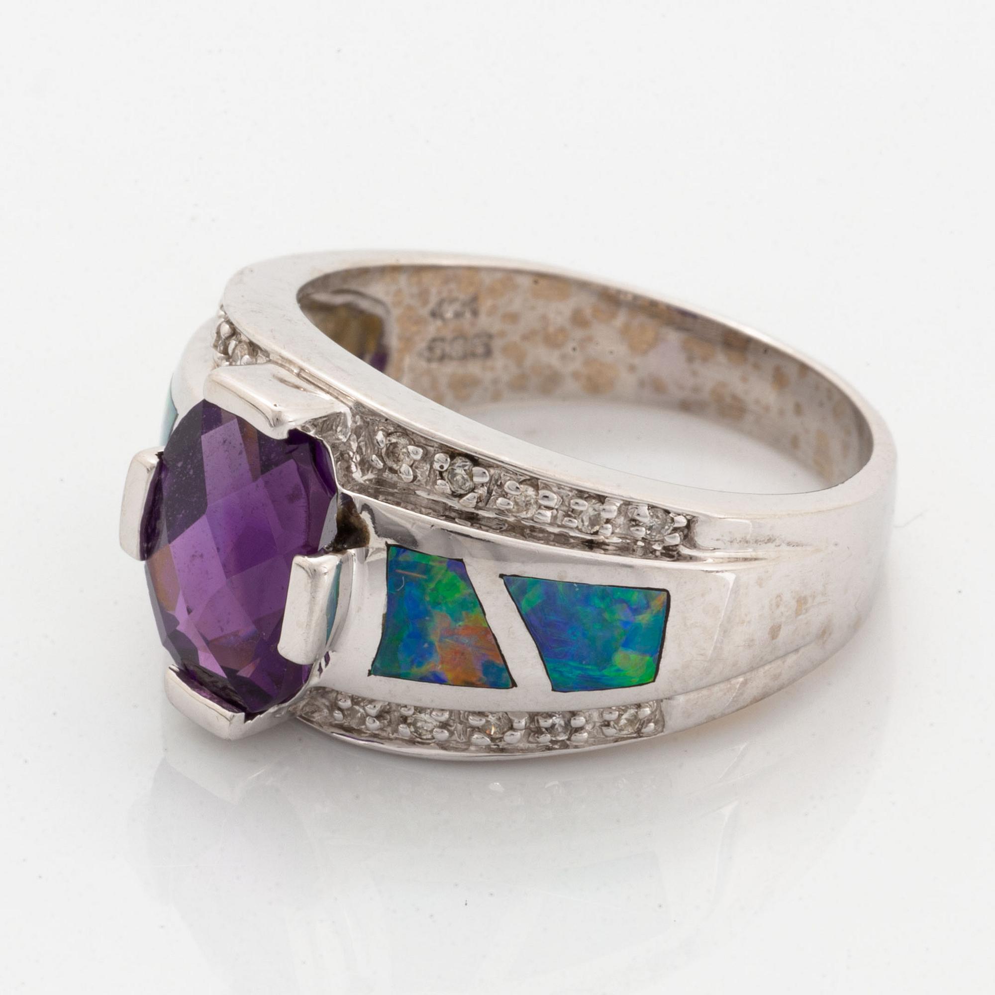 Checker-cut amethyst, opal and diamond ring.