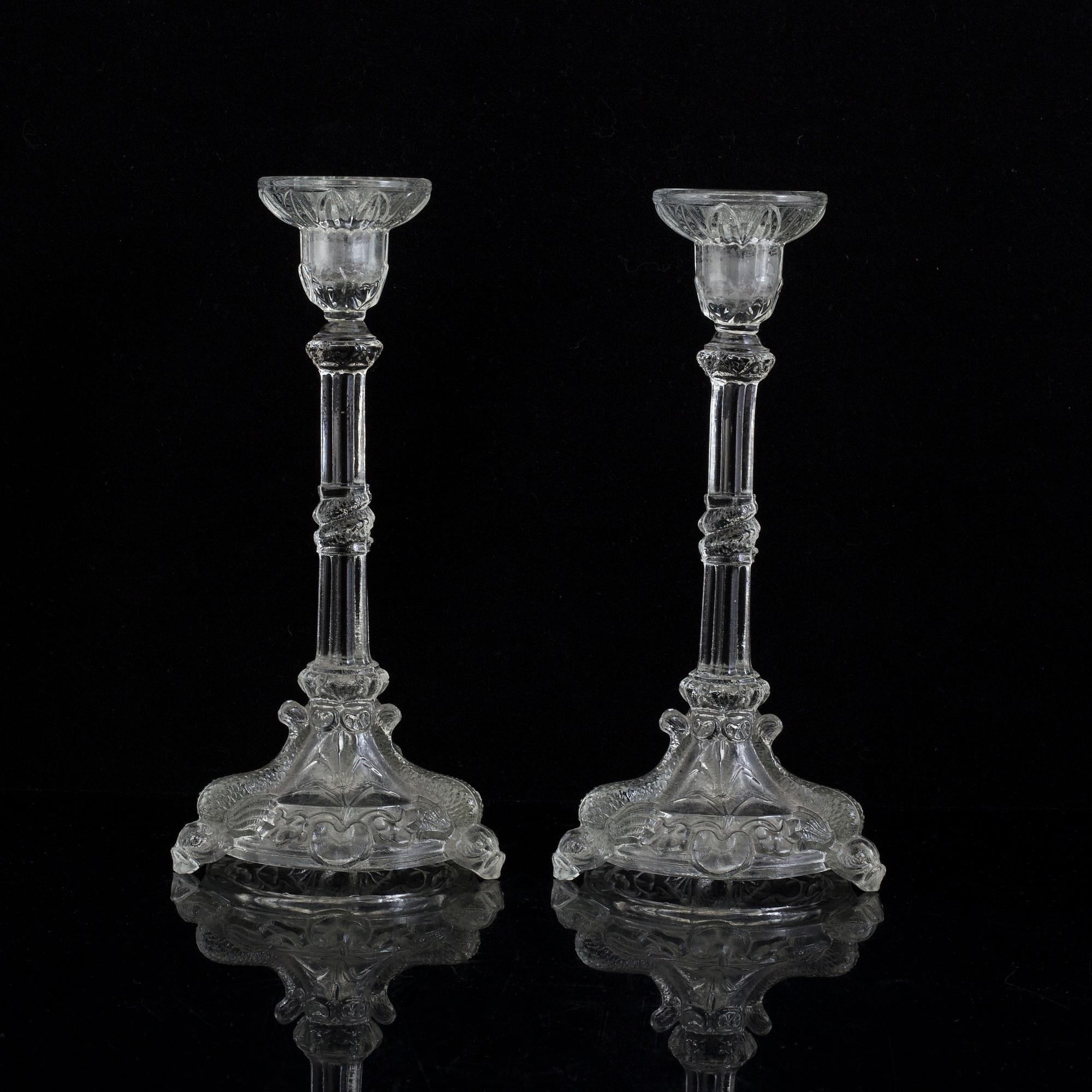 A pair of 18th century glass candlesticks.