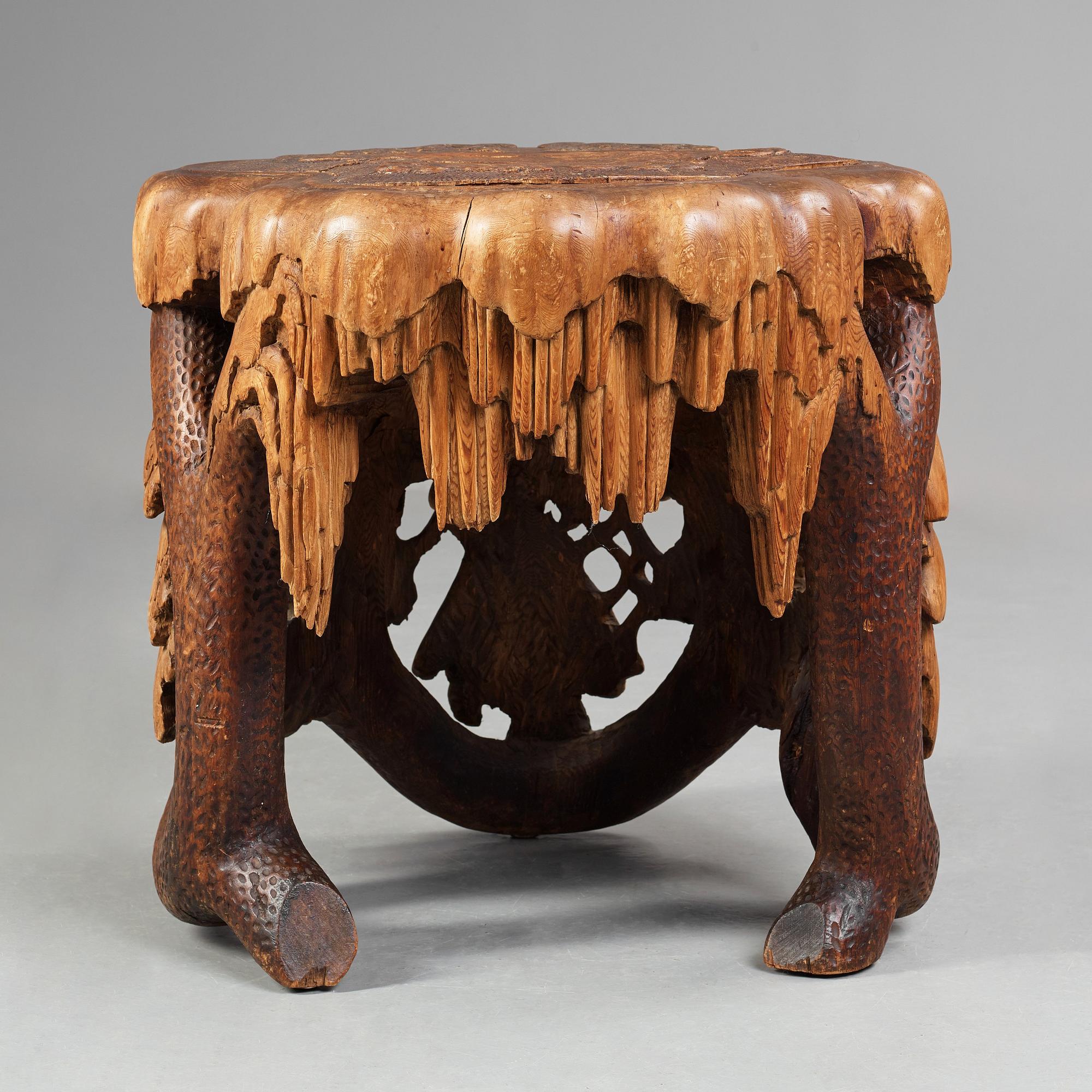 Knut Fjaestad, A Knut Fjaestad Art Nouveau sculptured pine table, Sweden ca 1900.