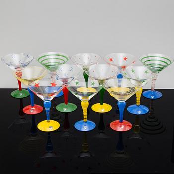 Twelve handpainted and signed 'Clown' martini glasses by Anne Nilsson, Orrefors.