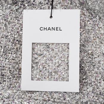 Chanel, a bouclé silver dress, size 34.