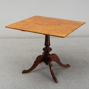 A 19th century tilt top table.