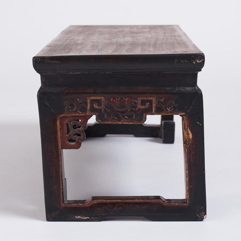 A Chinese lacquered Kang table, Qing dynasty.