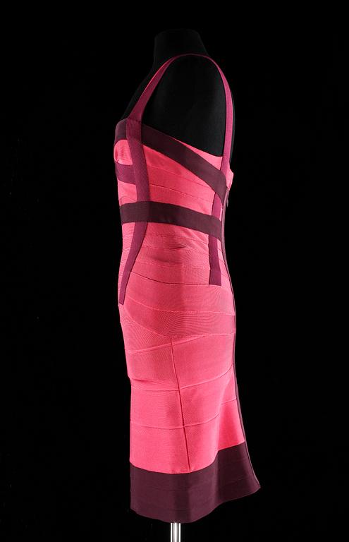 A pink and purple tight, strech dress by Herve Leger.