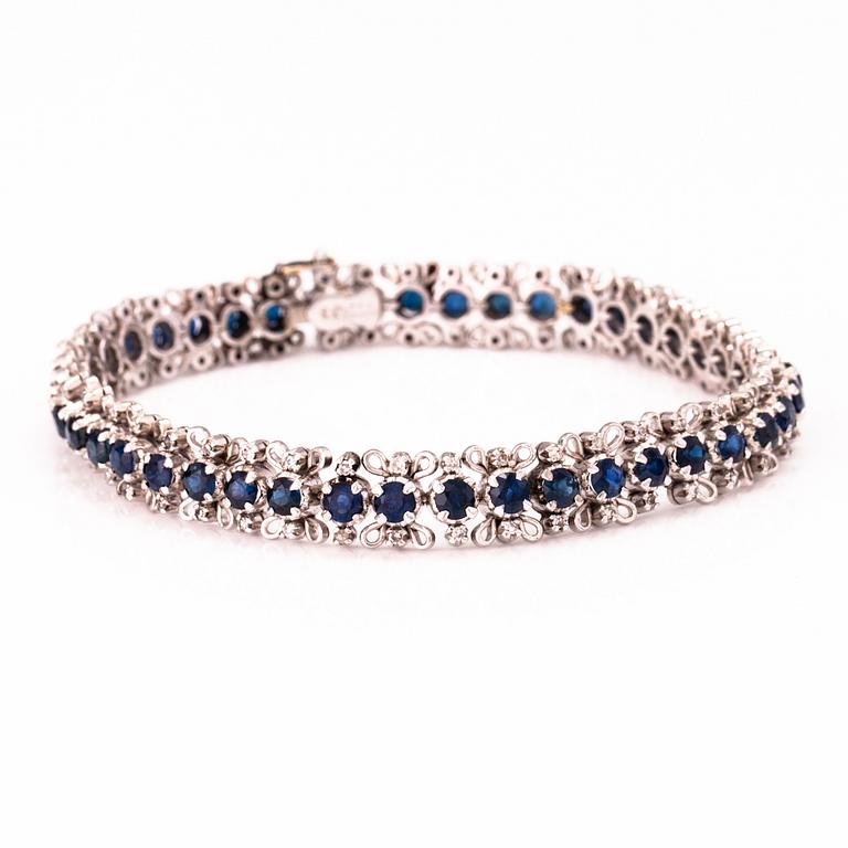 A white gold bracelet with sapphires and 8/8 cut diamonds ca. 0.75 ct in total.