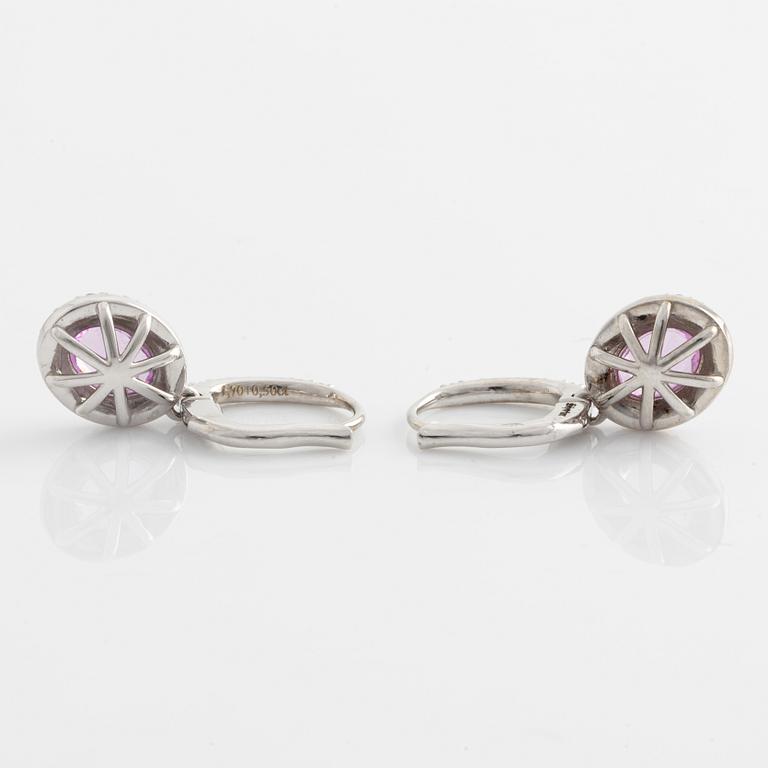 Earrings with pink sapphires and brilliant-cut diamonds.