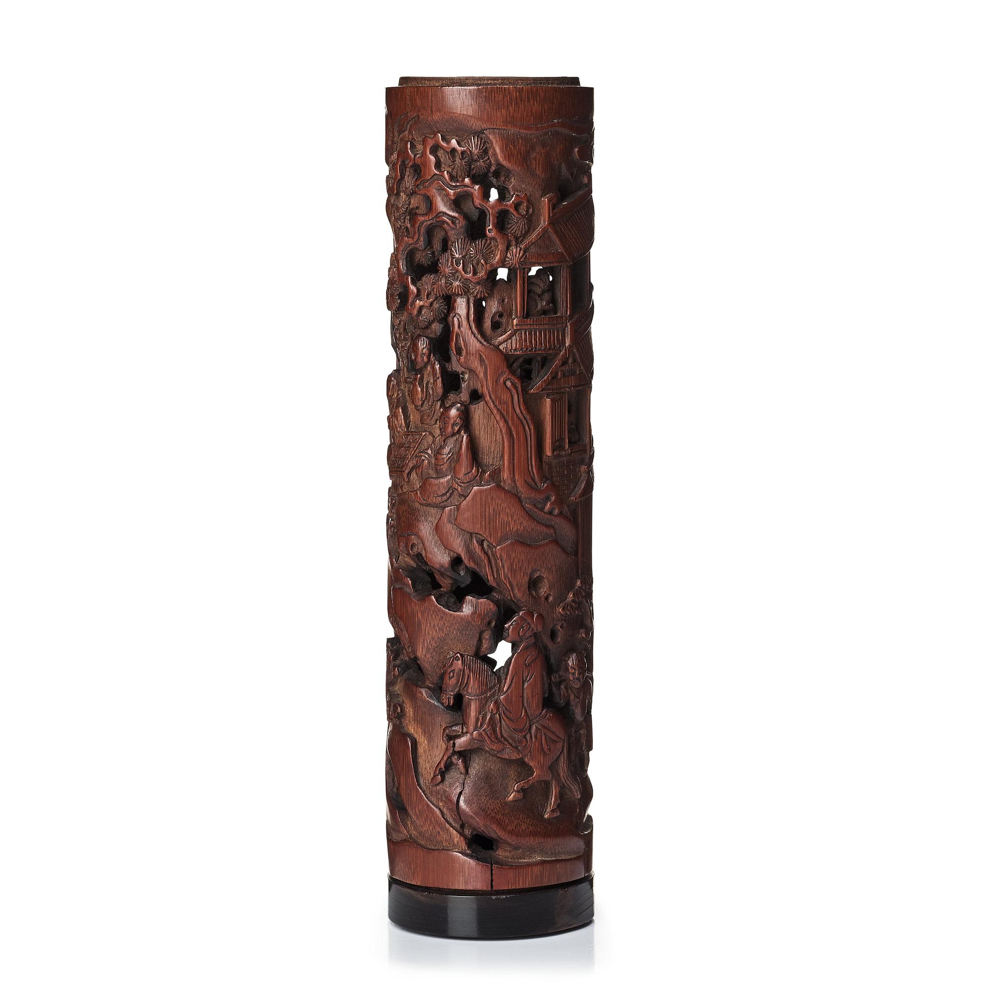 A carved cylindrical bambo parfumier, Qing dynasty, 19th Century.